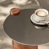 Side Table with Stainless Steel Tabletop and Curved Travertine Base