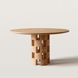 Round Dining Table with Sculptural Hollow Base