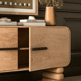Modern Storage Cabinet with Stacked Legs and Beaded Handles
